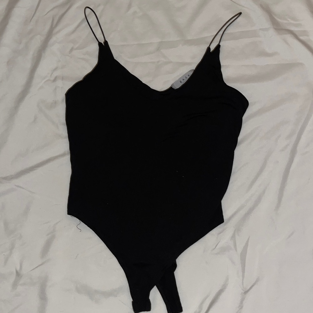 Black body suit, V neck. Good condition.